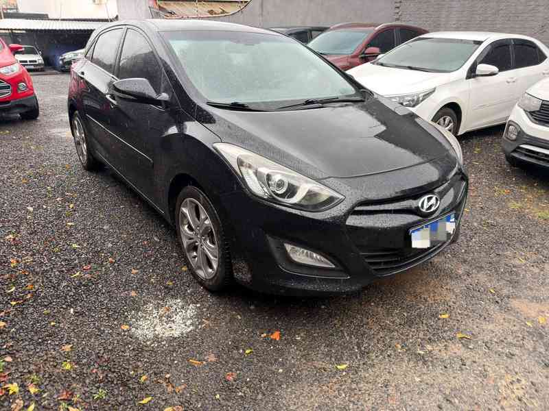 Honda CG 125 Fan e Hyundai i30 1.6 Aut — foto 2